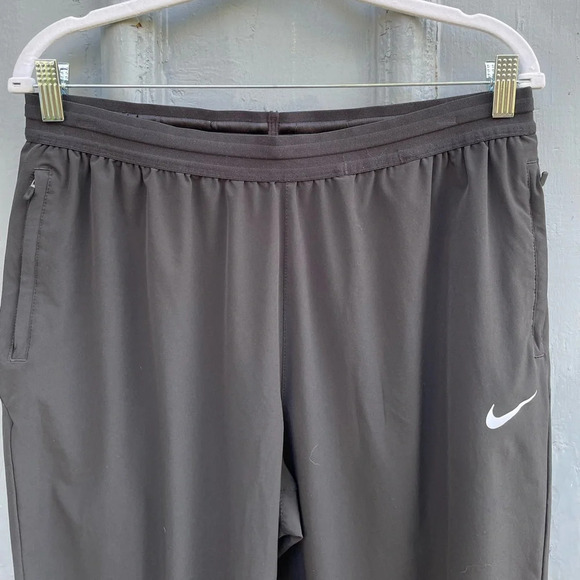 Nike  Women's Essential Running Pants, Black, size Large - Picture 8 of 16